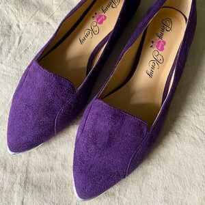 Purple flats with silver trim. NEW & NEVER WORN!